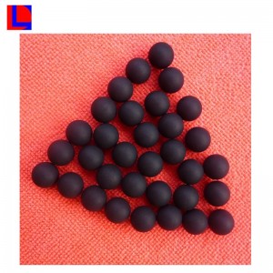 Musta kiinteä kumipallo, jossa on reikä teollisuudelle