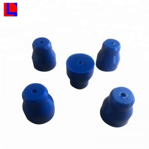 Punainen kartiomainen kumitulppa pullolle