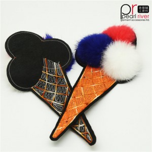 Korkealaatuinen käsin ommeltu käännettävä pom pom -jäätelölaastari