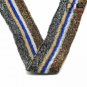 korkealaatuinen teippi kultalangalla