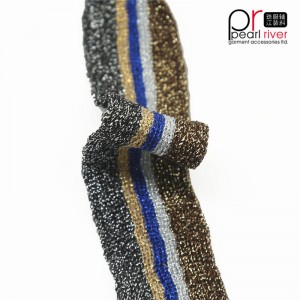 korkealaatuinen teippi kultalangalla