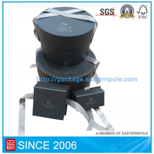 Ylellinen pyöreä suklaapakkaus, jossa on nauhan sulkeminen