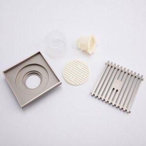 Messinkiä autotallin lattiakaivojen suojukset