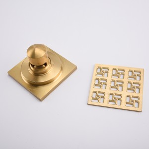 Matala suihkuaukon tyhjennys betonilattiassa