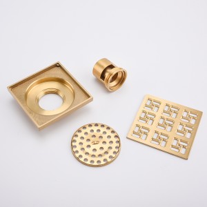 Matala suihkuaukon tyhjennys betonilattiassa