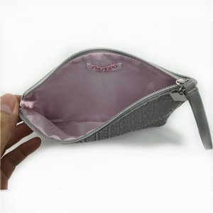 litteä kosmetiikkapussi