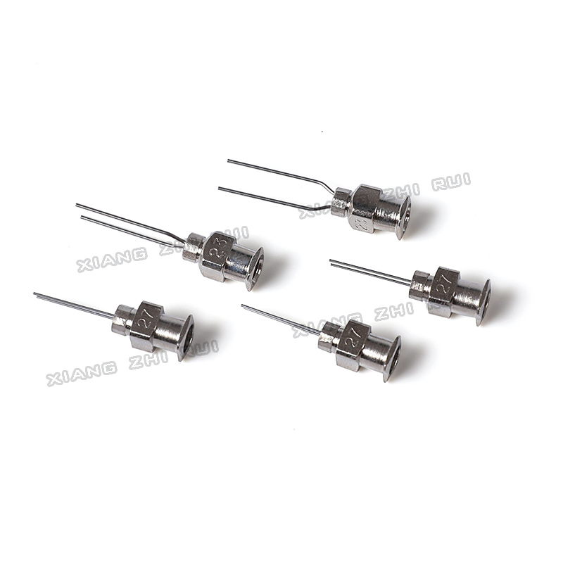 Kaksiputkinen annosteluneula