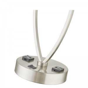 Nuku yksi kevyt pöytävalaisin harjatullanikkelillä, a/off -rokerikytkin ja kaksi pistorasiaa huoneessa