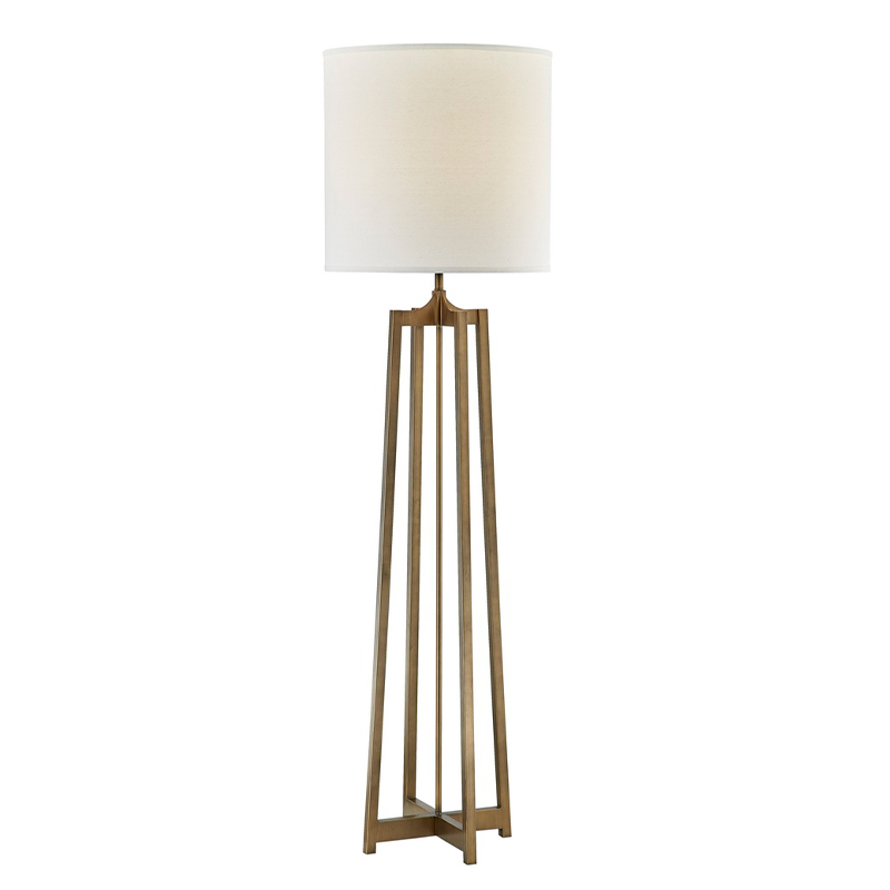 Hyatt Hotel -sohva lattiavalaisimen vieressä ja antiikkinen kultapinta huoneessa