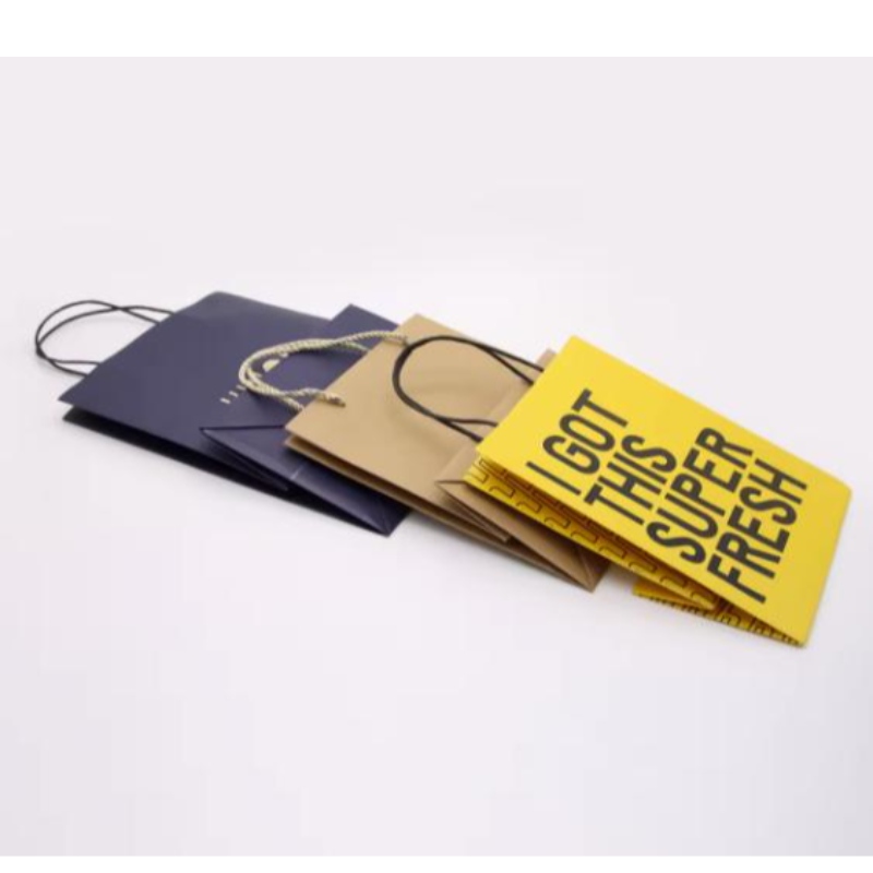 Räätälöity painetut logo Kraft Paper Packaging Bag Gift Crafts Shopping Biohapoinen paperipussi kahvalla