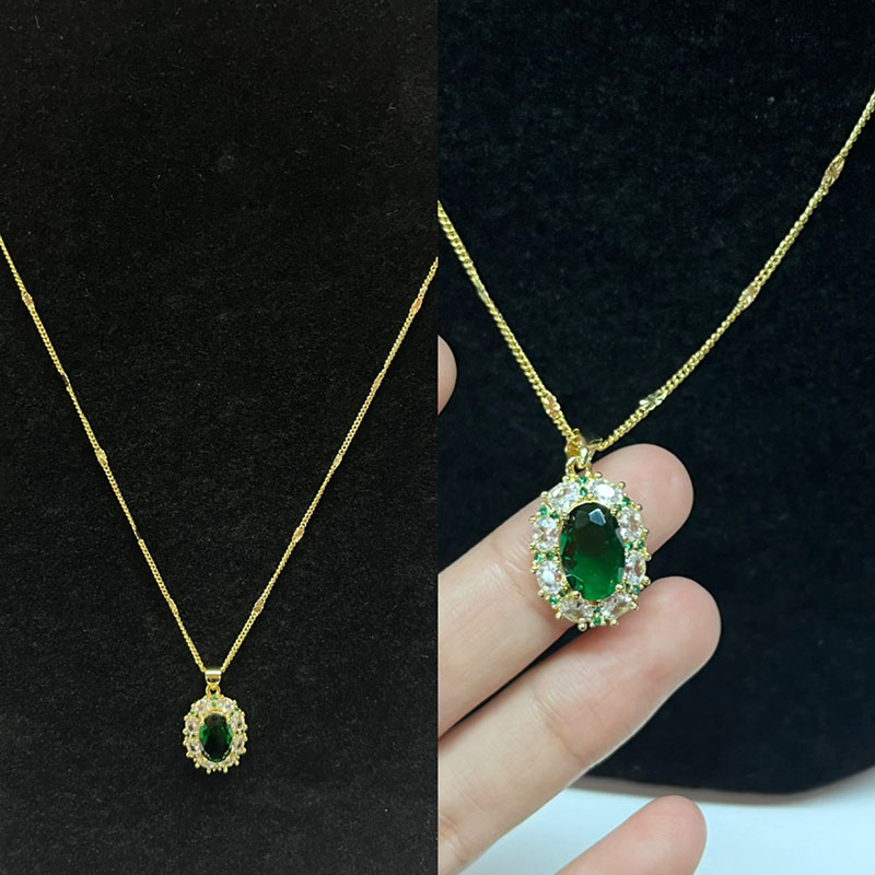 Regal Emerald Elegance Gold-Pinnoitettu vihreä jalokivikaulakoru kuohuviini -aksentteilla